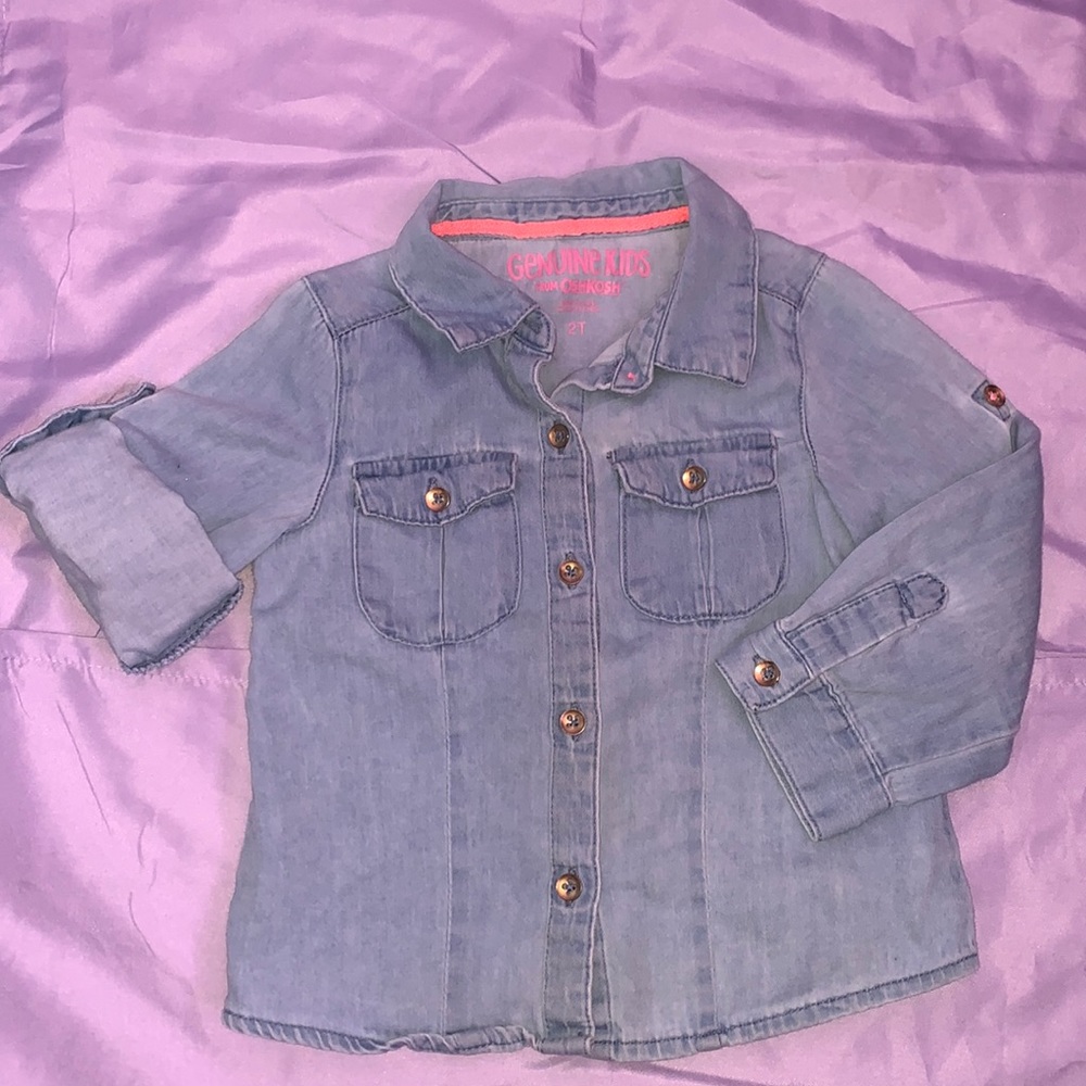 Button down shirt. Long sleeve/folded sleeves